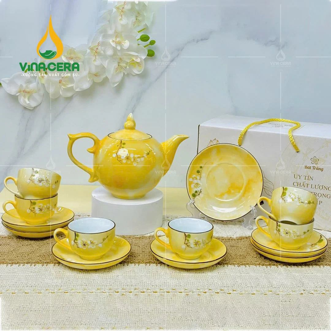 Tìm Hiểu Quy Trình Sản Xuất Gốm Sứ Bát Tràng Bộ ấm trà sứ men vân đá vẽ hoa đào trắng
