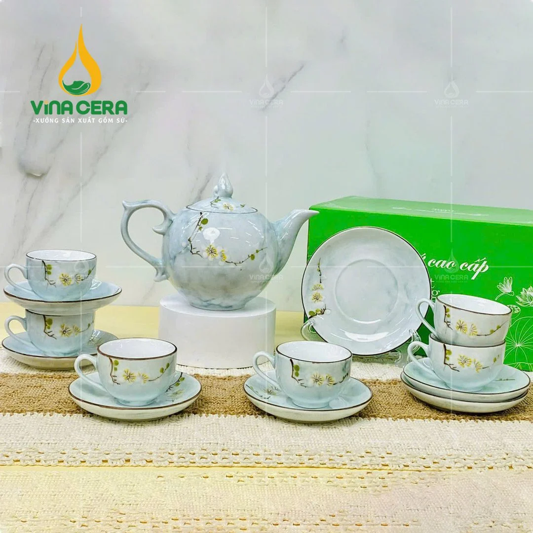 Top 10 Quà Tặng Tết Cao Cấp Ý Nghĩa Bộ ấm trà sứ men vân đá vẽ hoa đào trắng