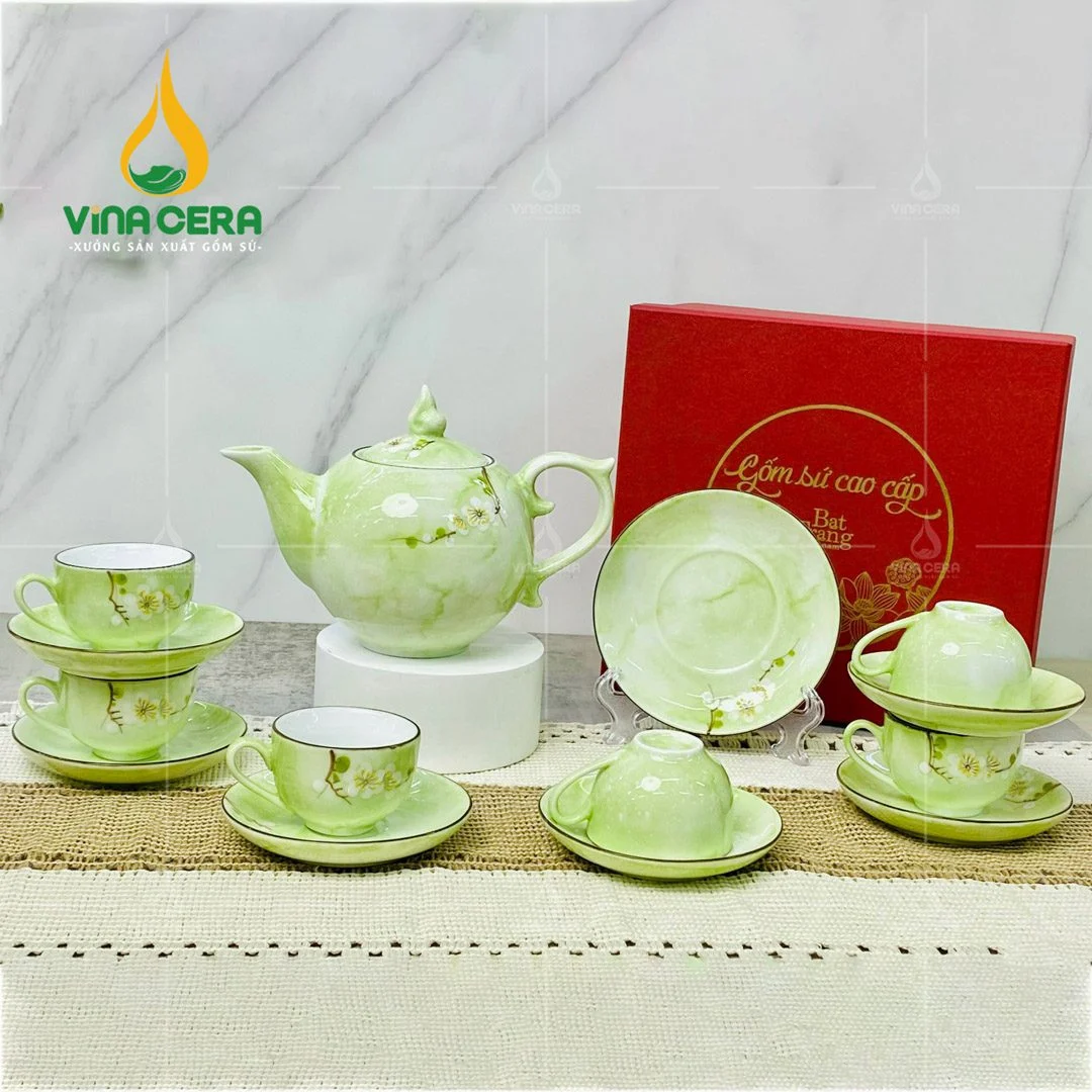 Bộ ấm trà sứ men vân đá vẽ hoa đào trắng