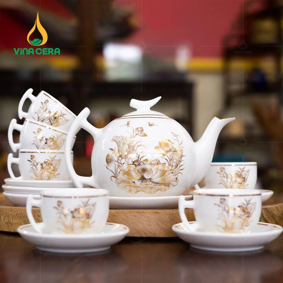 Xưởng sản xuất ấm chén Bát Tràng - Nơi Ghi Dấu Văn Hóa Gốm Sứ Việt Bộ-Ấm-Chén-Trăng-Khuyết-Vẽ-Sen-Vàng-Kim